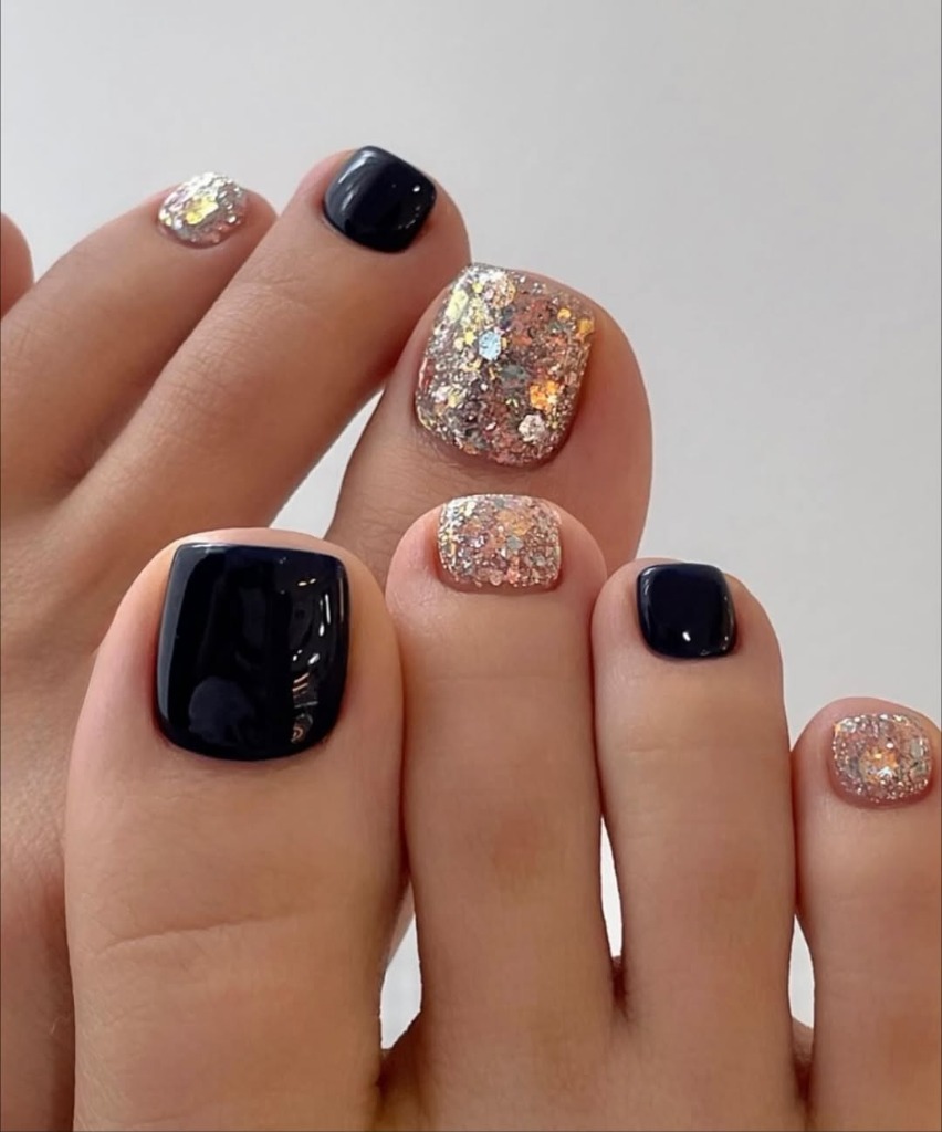 Glamorous black and glitter nail art